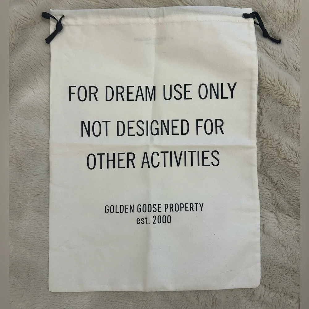 Golden Goose Cream Drawstring Bag with Black Text